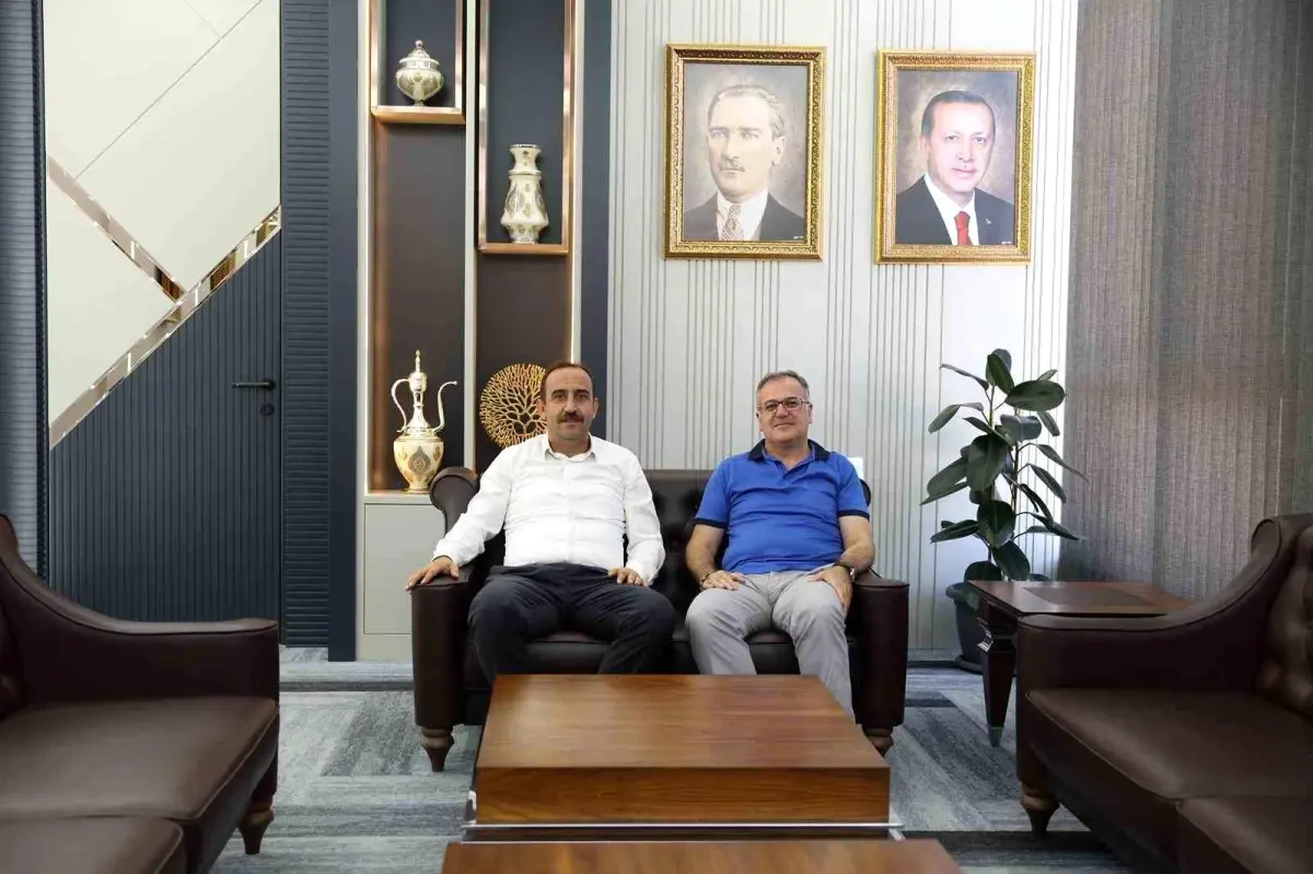 Başkan İlmek, Hacılar Belediyesi'ni Ziyaret Etti
